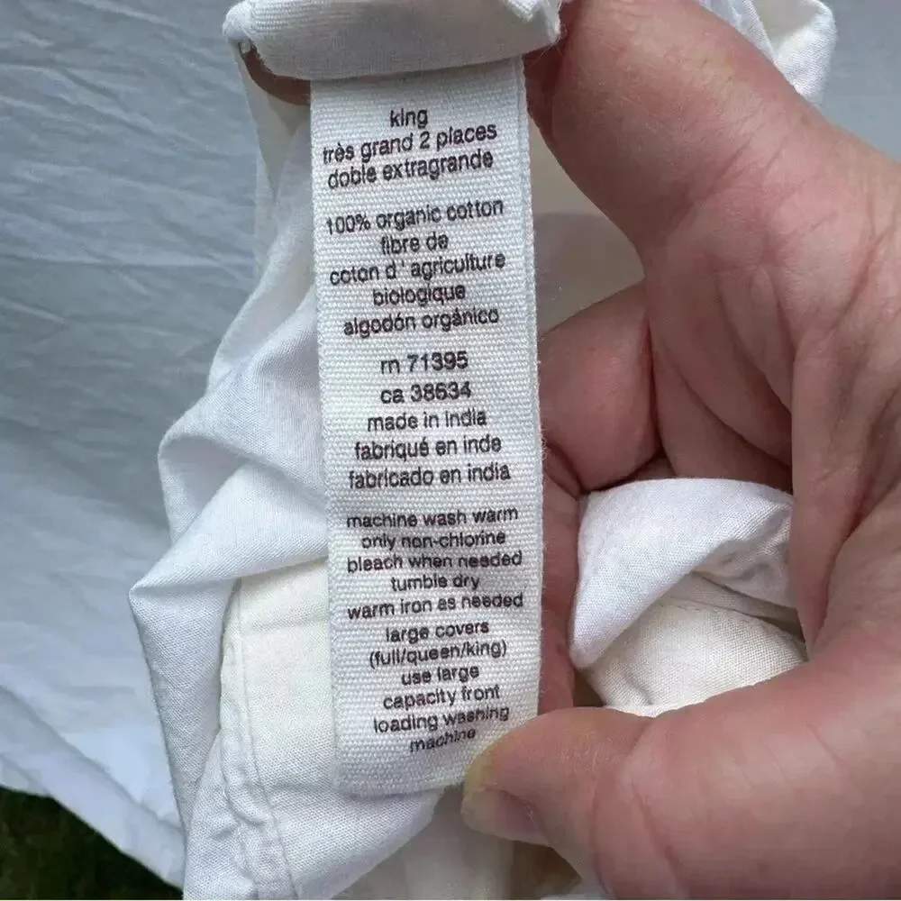 west elm green cream colored duvet cover in good condition some small flaws